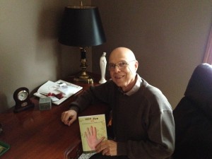 Dr. J. Campbell with book